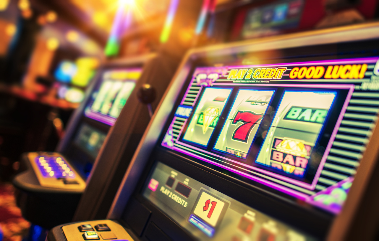 Casino Interior and Row of Classic Slot Machines. Las Vegas Gambling Theme
